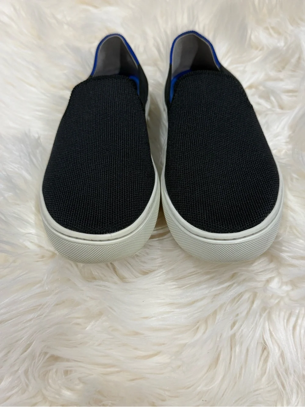 Rothy's Black Knit Slip-On Sneakers with Blue Accent